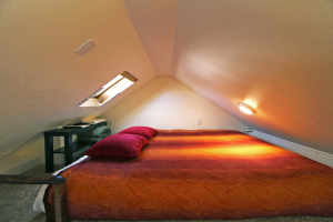 Super comfortable queen size bed in the loft. Sheets, pillows, and comforter are provided.